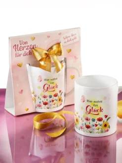 Geschenktasse „Hier wohnt das Glück“